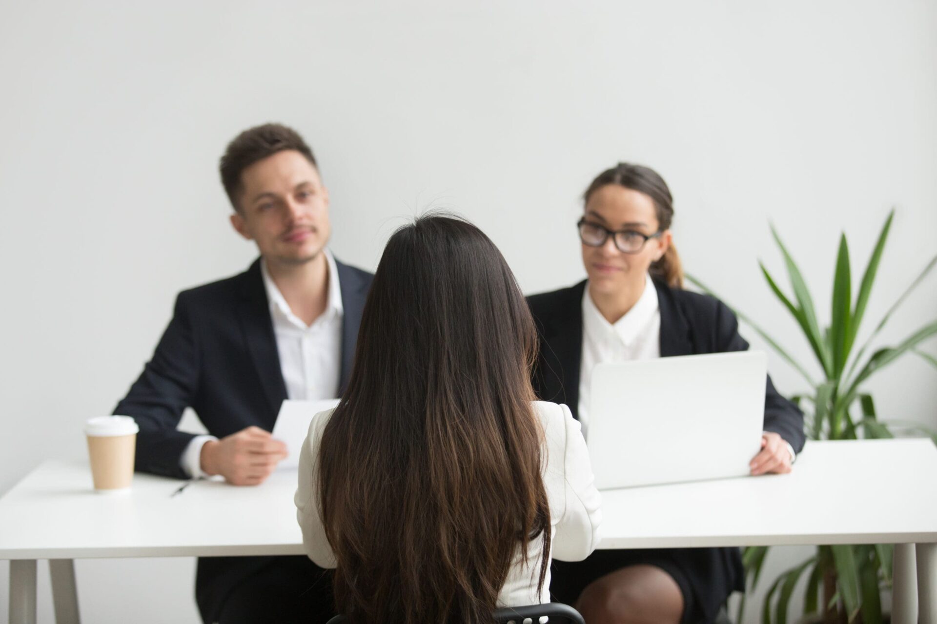 headhunters interviewing female job candidate scaled 1 headhunters interviewing female job candidate scaled 1